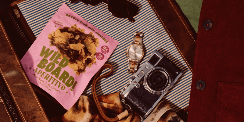 A single WildBoard pouch packed for the day, a small portion of savory trail mix clusters with real protein and fiber