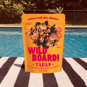 WildBoard Tapas savory trail mix clusters in a 3.5 ounce stand up pouch with 15g protein and 12g fiber callouts, made with Marcona almonds and smoked paprika, vegan and made with gluten free ingredients