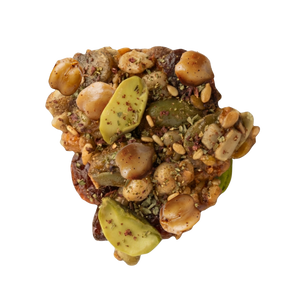 Close up of Mezze savory trail mix clusters made from roasted chickpeas, pistachios, pepitas, and za'atar seasoning
