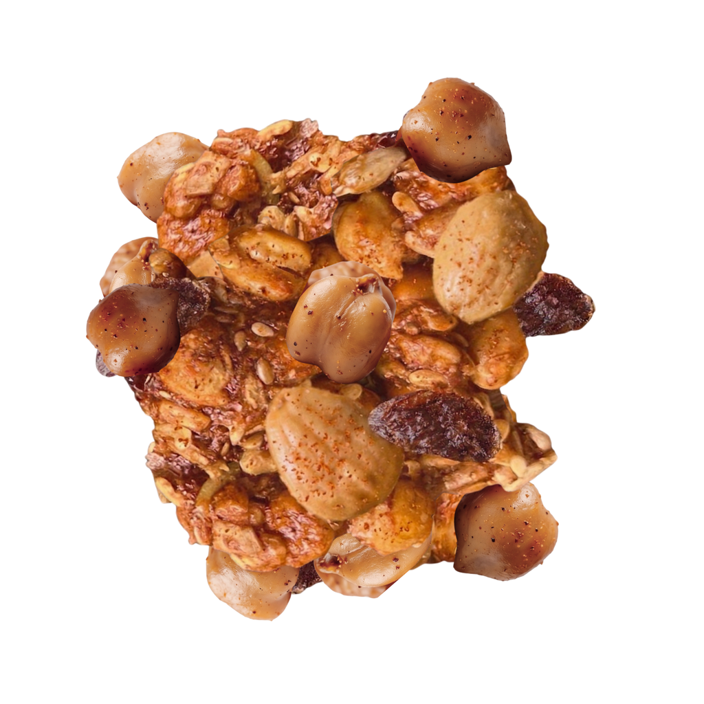 Close up of Tapas savory trail mix clusters made from roasted chickpeas, Marcona almonds, pepitas, and smoked paprika
